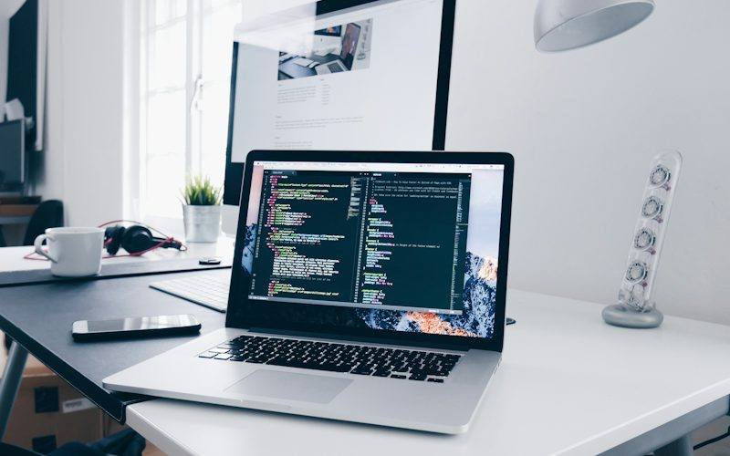 Developer laptop with source code for custom software development